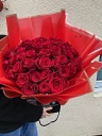 Only The Best - Hand tie design of pink first grade roses